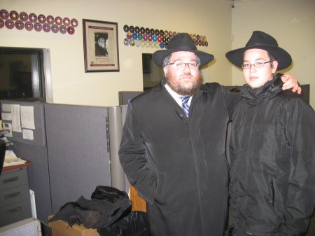 Rabbi Ovadiah Goldman, Shliach to Oklahoma City and Mendel, the Bar Mitzvah boy at the JEM production office.